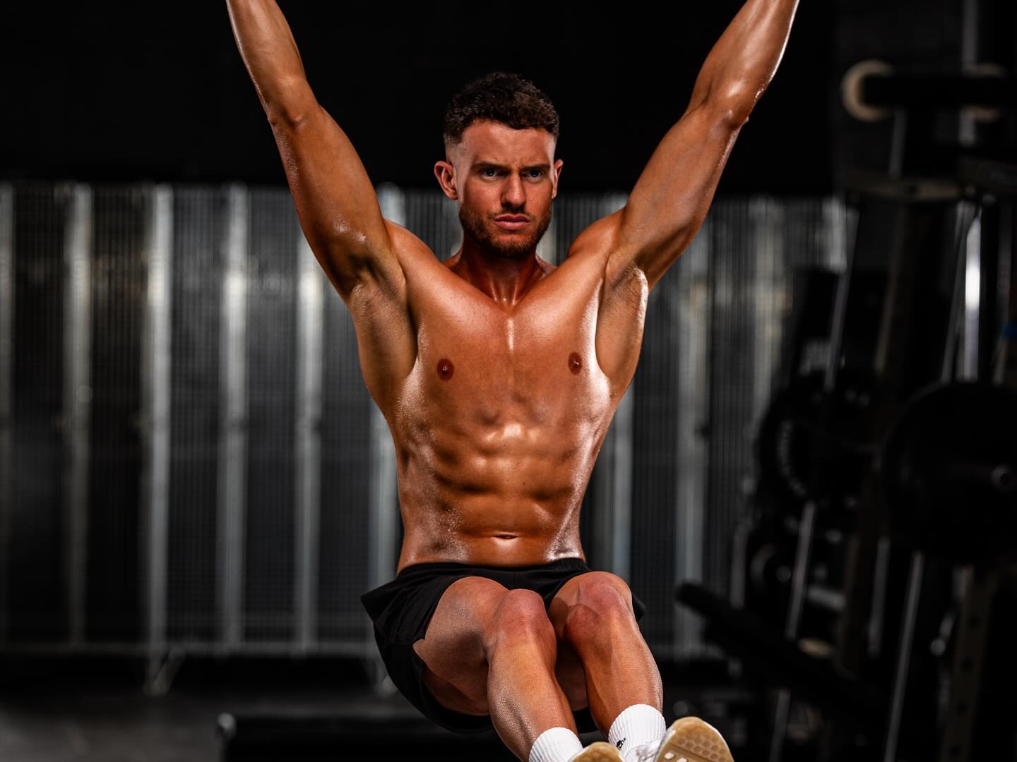 Sam Wilko performing a hanging core exercise
